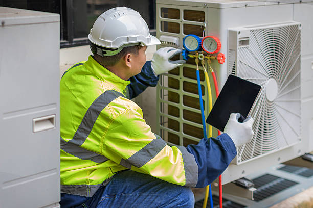 Professional Air Duct Cleaning technician working in West Hollywood, CA